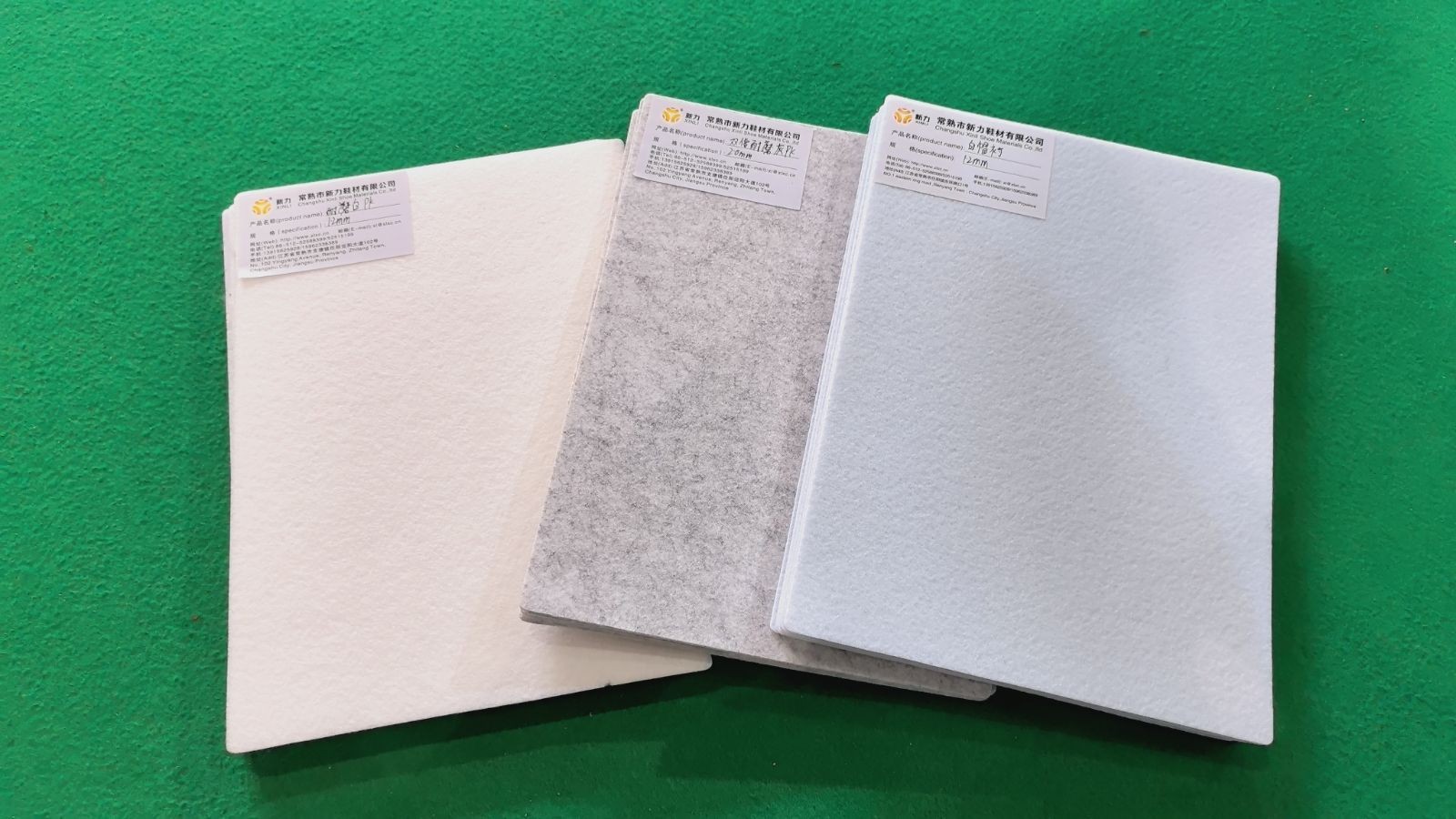 COTV全球直播-常熟市新力鞋材有限公司专业生产:抗静电无纺布中底、等劳保鞋材料；黑色、白色、灰色软硬毛毡、阻燃无纺布等汽车用毡及家居、家电用无纺布；黑白色帽衬用无纺布；特厚特硬等产品，欢迎大家光临！